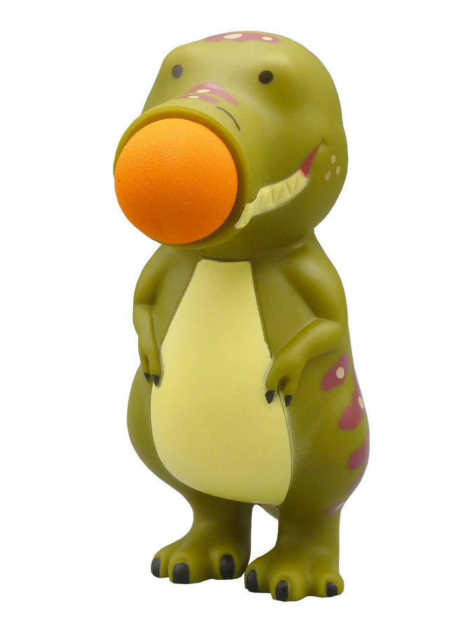 Plopper Dino mit Ball im Maul und sechs Bällen spielbereit zum Ploppen