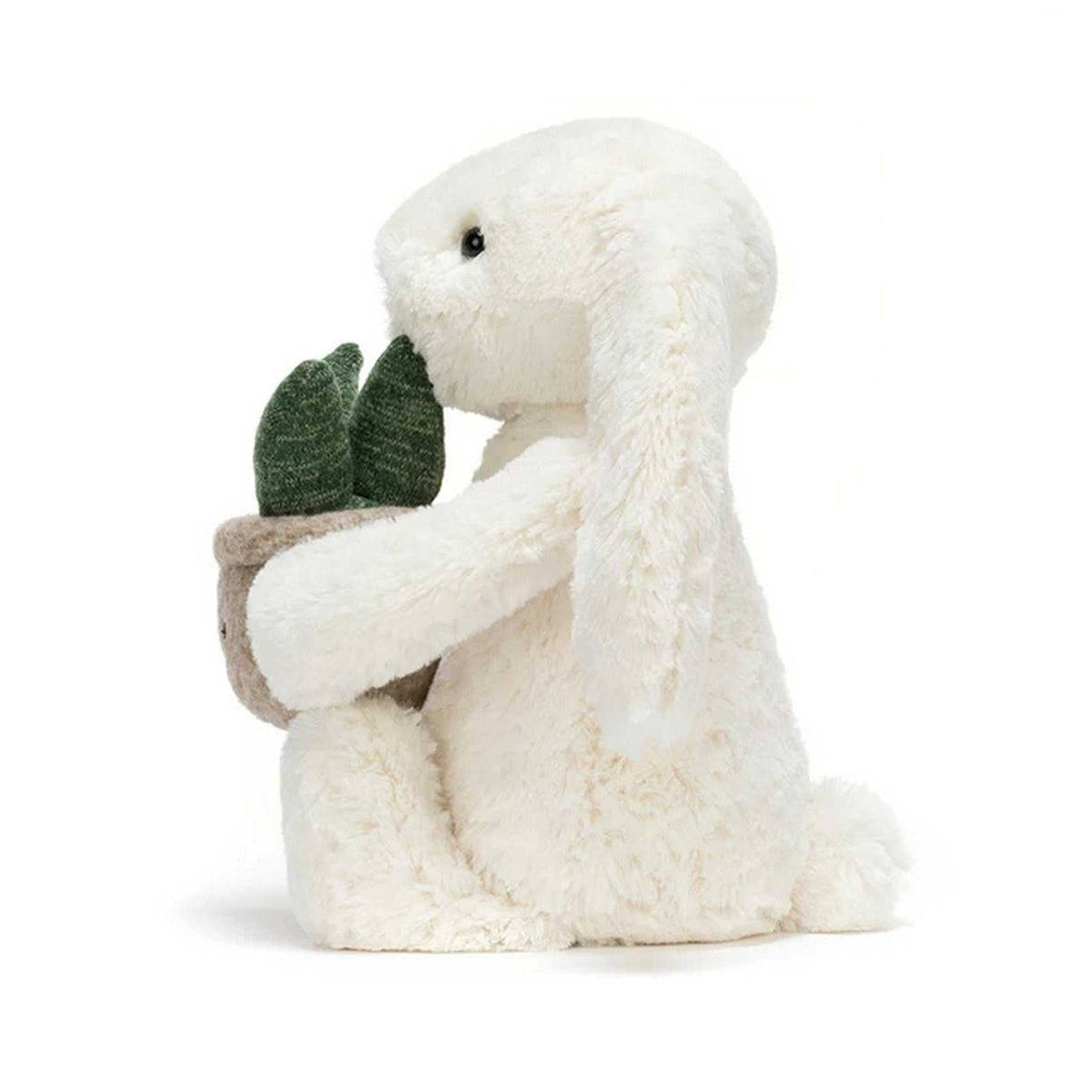Kusche- Hase mit Pflanze